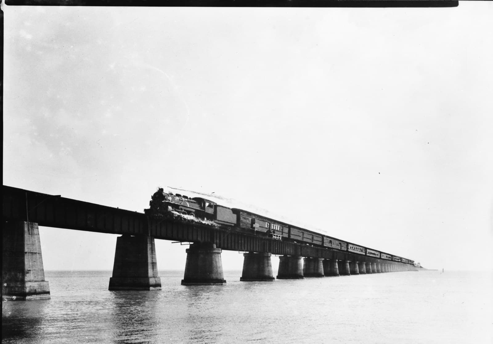 A passenger train crossing the Knight's Key bridge on the Key West Extension